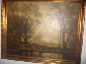 Cows drinking at the lake